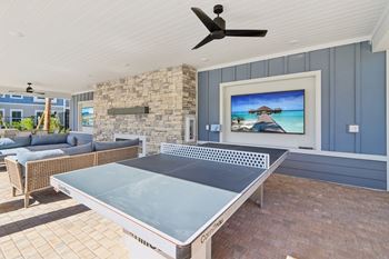 Covered patio with ping pong table